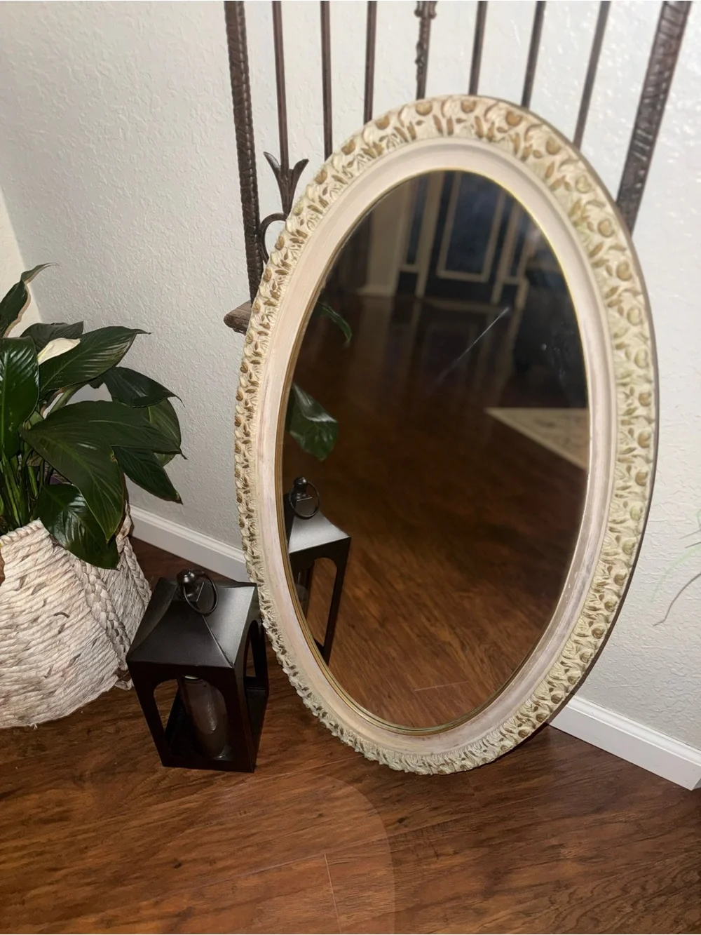Vintage Oval Wall Mirror Featuring An Ornate, Off-White And Gold-Accented Frame